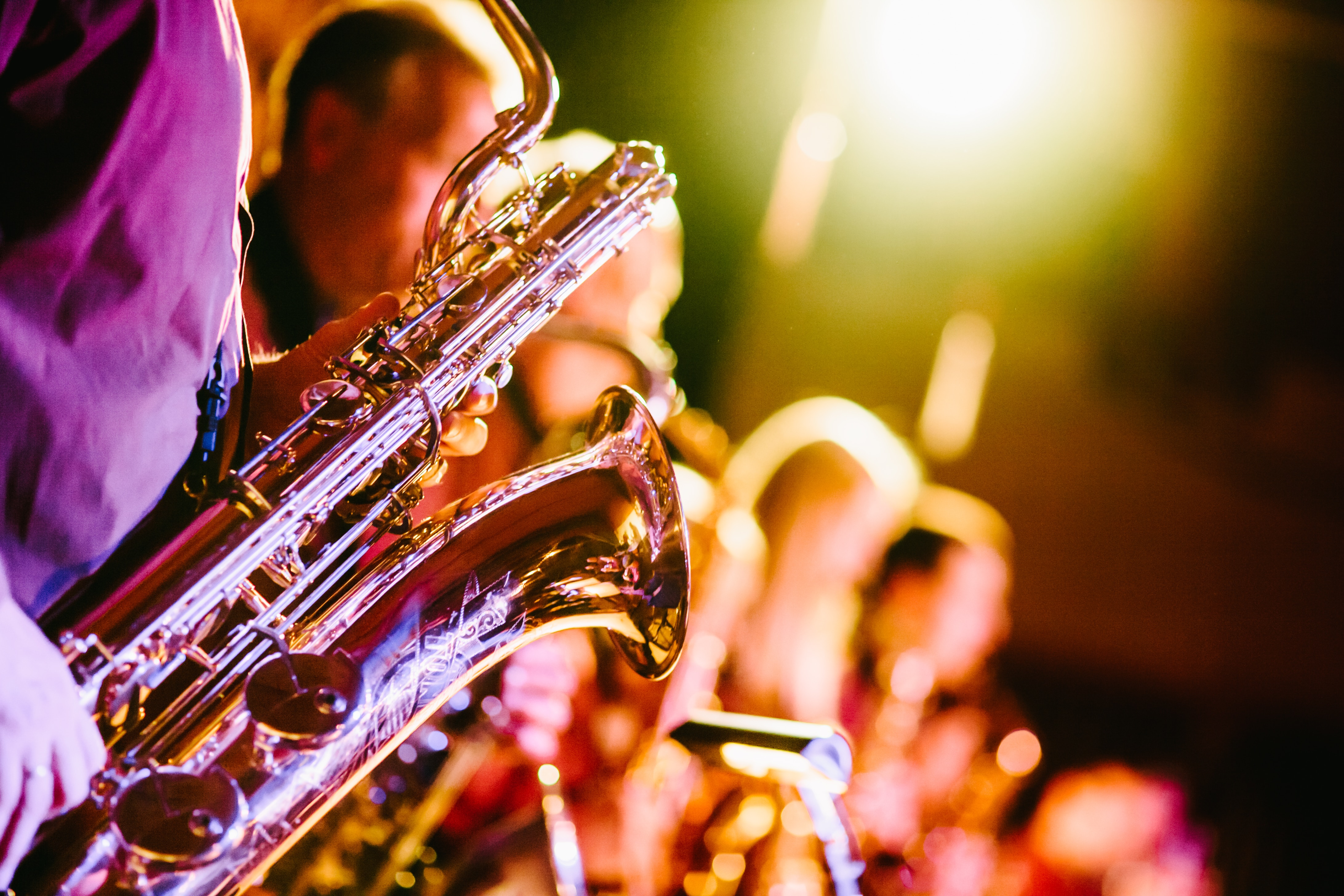 Close-up of saxophones being played during the Copenhagen Jazz Festival in an open-air venue.